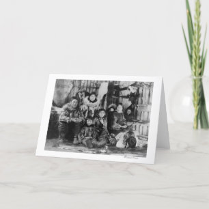 Carte Famille esquimaude en photographie d'igloo d'hiver