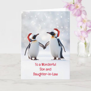 Carte Fils et fille en droit de mignons pingouins dans l