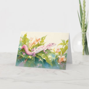 Carte Gecko à taches roses dans une floraison tropicale