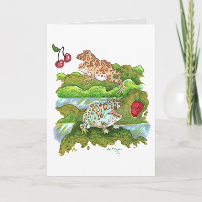 Carte Grenouilles à cornes ornées pourchassant des fruit (Devant)