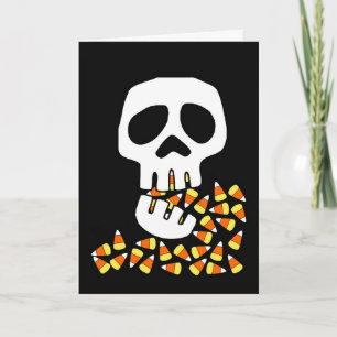 Carte Halloween, crâne manger du maïs, des bonbons ou de