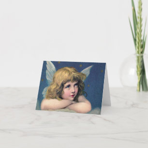 Carte Heavenly angel daydreaming on a cloud in the sky