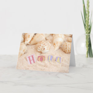 Carte Hola, Bonjour en espagnol sur une plage de sable