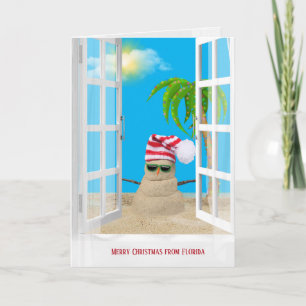 Carte Joyeuse fenêtre de Noël avec sandman tropical