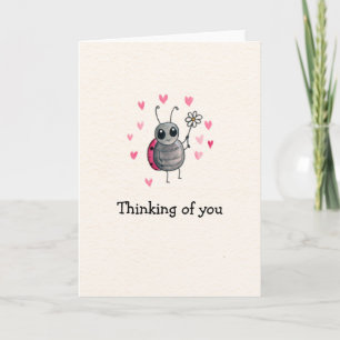 Carte La coccinelle mignonne et la marguerite pensant à