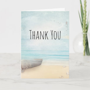 Carte La plage côtière avec Merci en bateau à bois