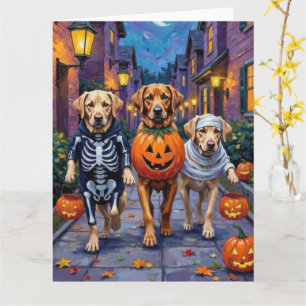 Carte Labradors faisant Trick-or-Treat dans des costumes