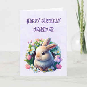 Carte Lapin de Pâques bébé dans des fleurs printanières