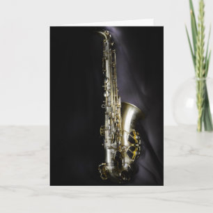 Carte Magnifique saxophone en laiton sur arrière - plan 