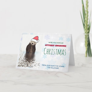 Carte Mignonne Otter portant un chapeau de Père Noël