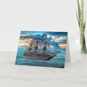 CARTE NAVIRE DE PIRATE ANCRÉ AU COUCHER DU SOLEIL