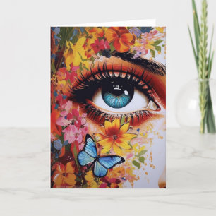 Carte Oeil avec fleurs et papillon