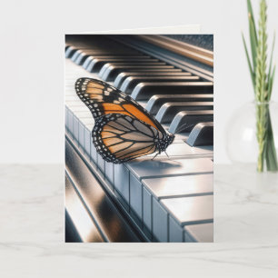 Carte Papillon Monarque sur un clavier de piano