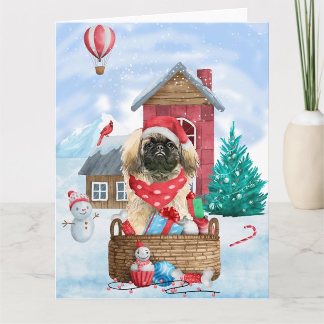 Carte Pékinois dans une maison de chien de Noël enneigée (Devant)
