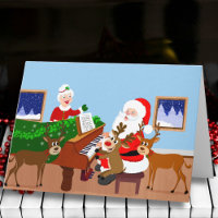 Père Noël jouant du piano avec couverture de renne