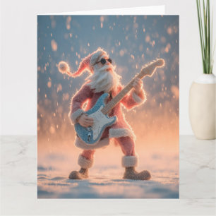 Carte Père Noël jouant une guitare électrique