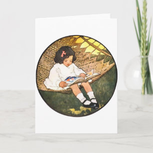 Carte Petite fille lisant dans un hamac