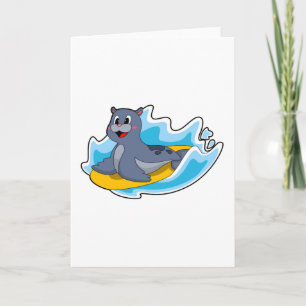 Carte Phoque en surfeur avec planche de surf