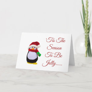 Carte Pingouin bourré de jouet habillé pour l'hiver