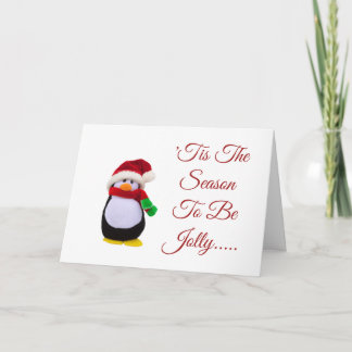 Carte Pingouin bourré de jouet habillé pour l'hiver