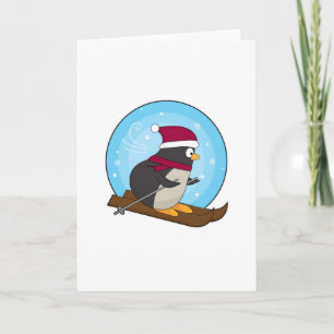 Carte Pingouin comme skieur avec ski
