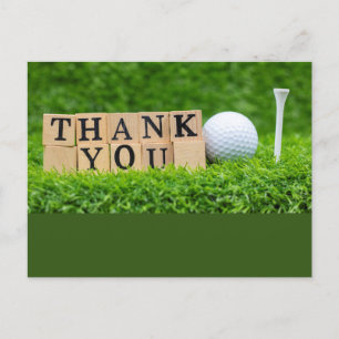 Carte Postale Balle de golf avec le mot merci sur de l'herbe ver