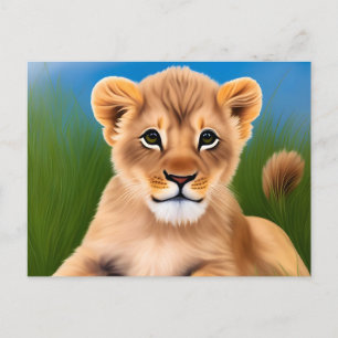 Carte Postale Bébé lion posé sur l'herbe verte