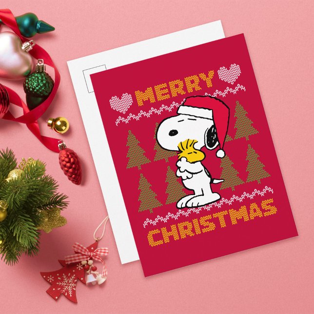 Carte Postale cacahuètes | Snoopy & Woodstock Santa Claus Hug (Card on table)