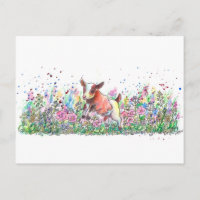 Chèvre de bébé en champ de fleurs
