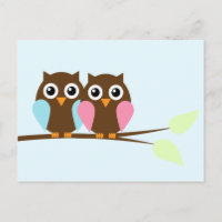 Couple d'hibou sur une branche