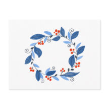 Couronne d'hiver. Bleus feuilles et baies rouges