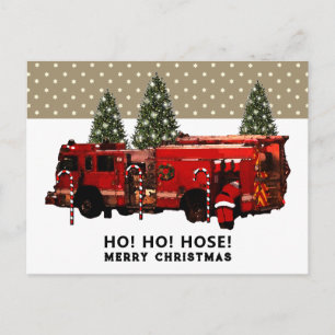 Carte postale de Noël drôle de pompier