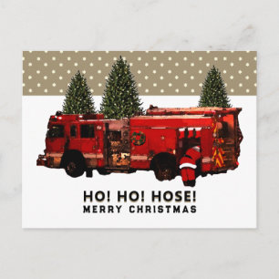 Carte postale de Noël drôle de pompier