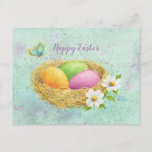 Carte postale de Pâques avec nid d'oeufs colorés