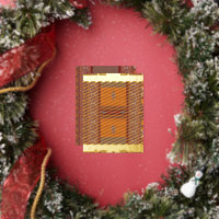 un motif de point de croix en orange et marron