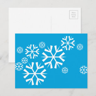 Carte Postale Des flocons blancs sur un Arrière - plan bleu