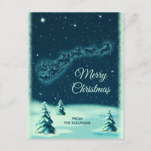 Carte Postale Des rennes tirent Père Noël dans le ciel nocturne