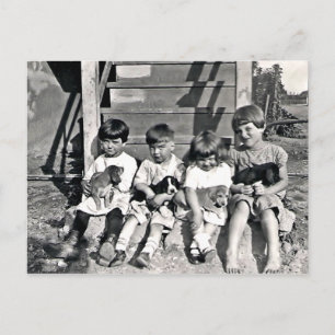 Carte postale Enfants avec chiots