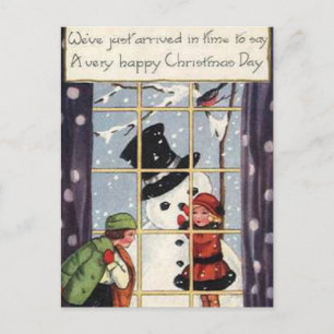 Carte Postale Enfants construisant Snowman