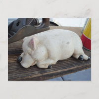 Figurine de cochon couché