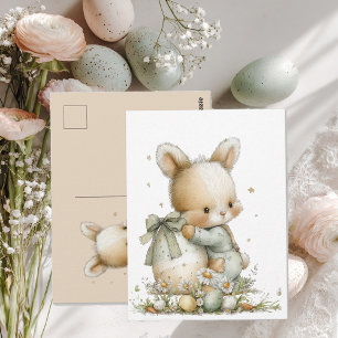 Carte Postale Lapin bébé mignon en pyjama avec un œuf de Pâques