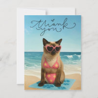 Le chat est sur la plage