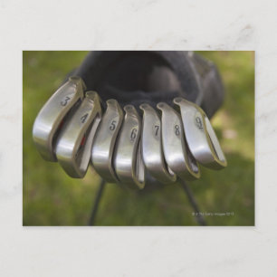 Carte Postale Le club de golf se dirige dans un sac. Trois à neu