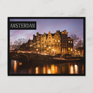 Carte Postale Les maisons du canal d'Amsterdam au bord de la nui