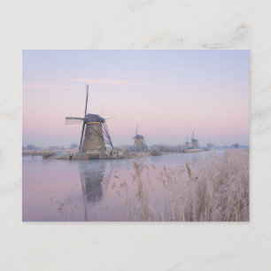 Carte Postale Lumière du lever du soleil en hiver sur les moulin