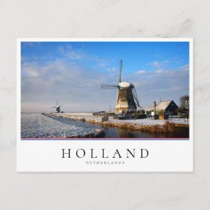 Carte Postale Moulin à vent dans la neige dans un paysage hivern