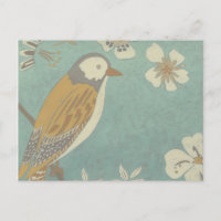 Oiseau jaune, gris et beige perché sur une branche