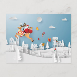 Carte Postale Papercut Père Noël livre un cadeau sur la ville No