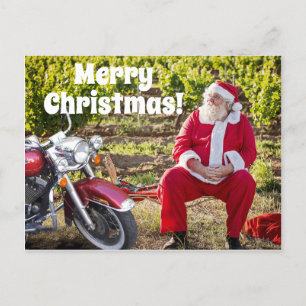 Carte Postale père Noël se reposant avec sa moto Noël