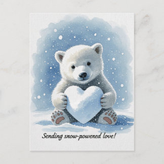 Carte Postale Polar bear in the snow with heart shaped snowball